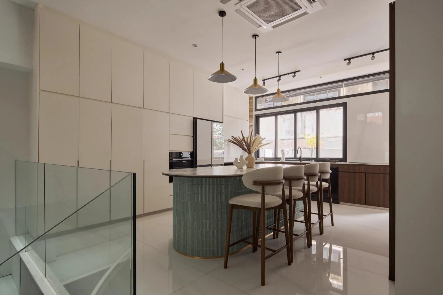 Kitchen with large island and casual seating