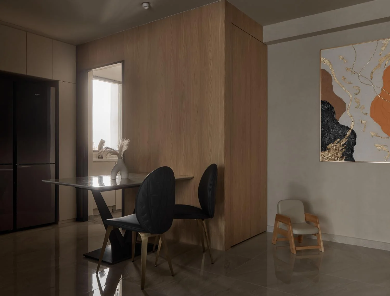 Dining area and foyer cabinetry at Esparina Residences