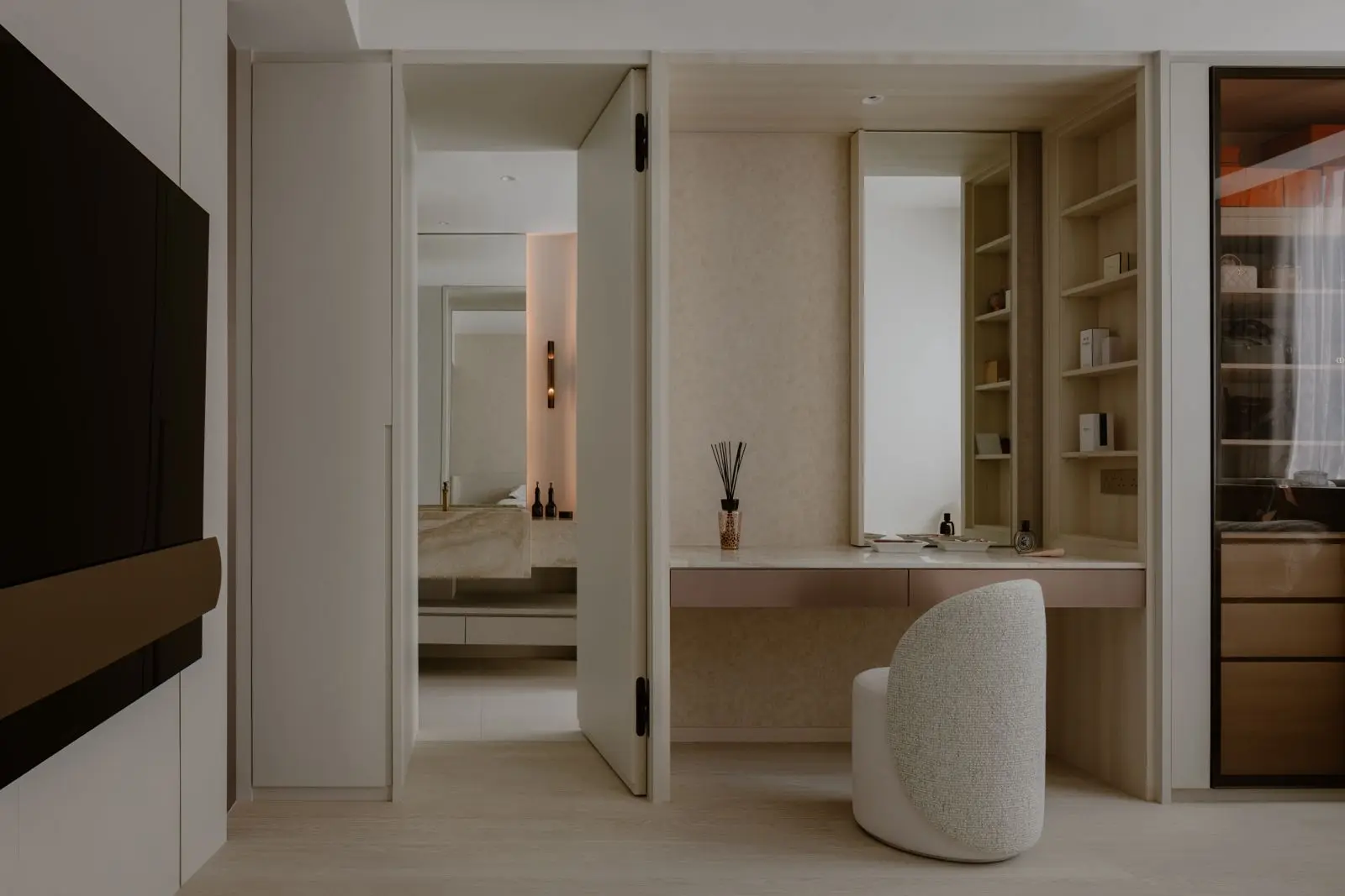 Dressing vanity integrated into pale timber cabinetry